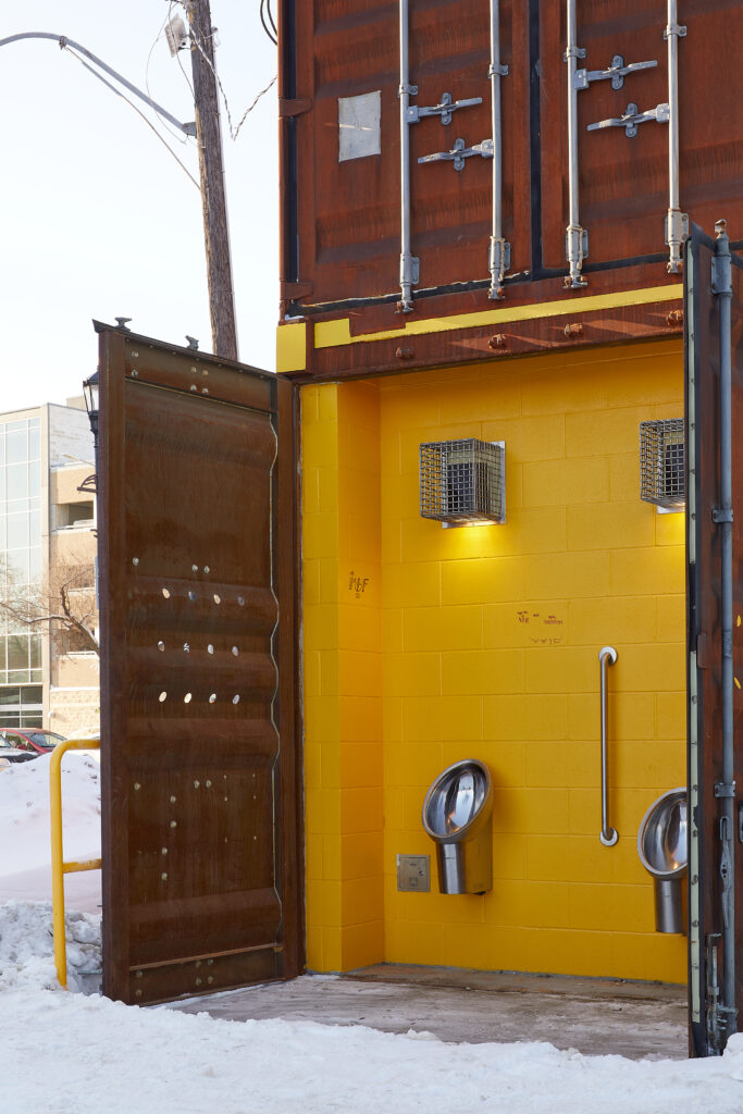 Photos depicting outdoor urinals, indoor washroom stalls and indoor water fountains at Amoowigamig.