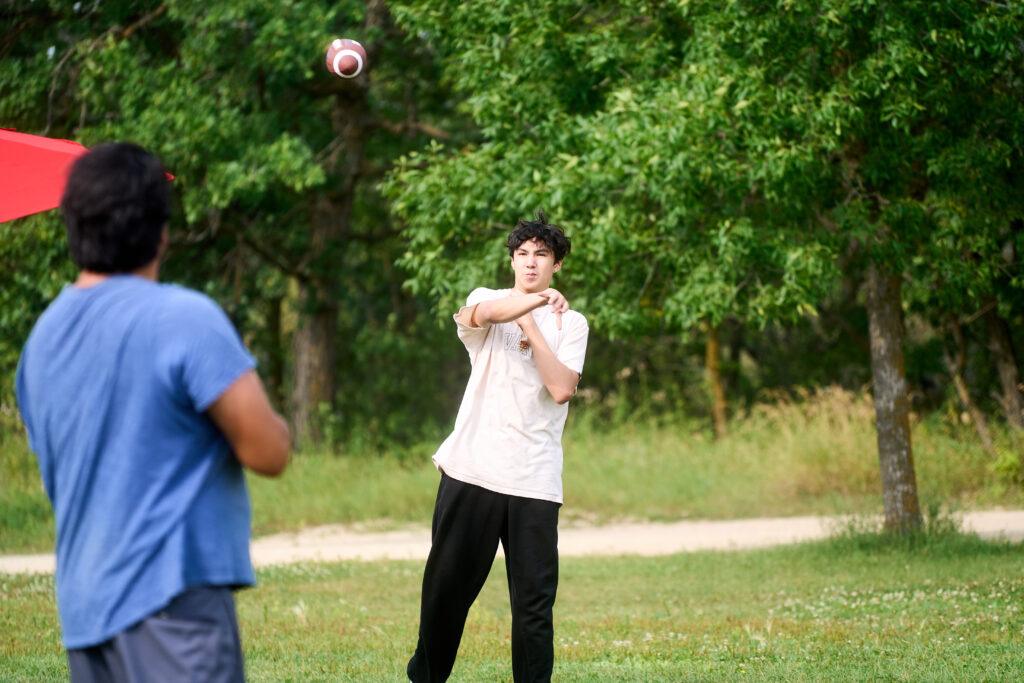 Camp Firefly participants playing football