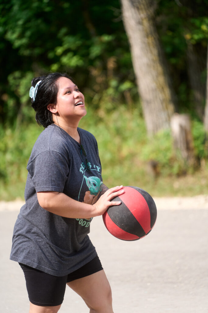 Camp Firefly participants shooting hoops