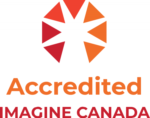 Logo: Accredited Imagine Canada. Illustration of a partial circle composed of small triangles in shades of red and orange pointing inward.